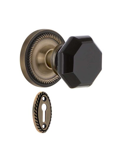 Rope Rosette Mortise Lock Set with Colored Waldorf Crystal Glass Knobs Black in Antique Brass.